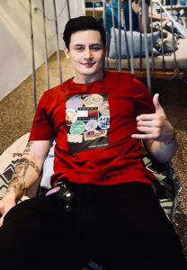 Kevin-Sagra-เสื้อยืดแดง